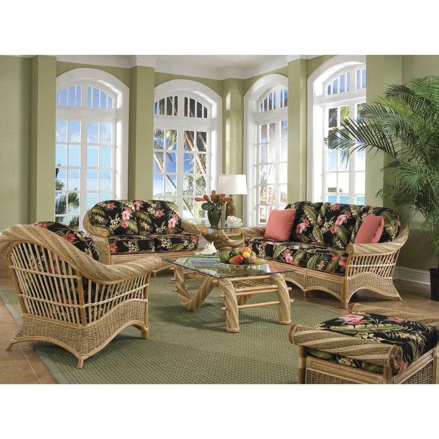Maui Twist end table holding a lamp between the loveseat and sofa, with the twisted leg coffee table in front