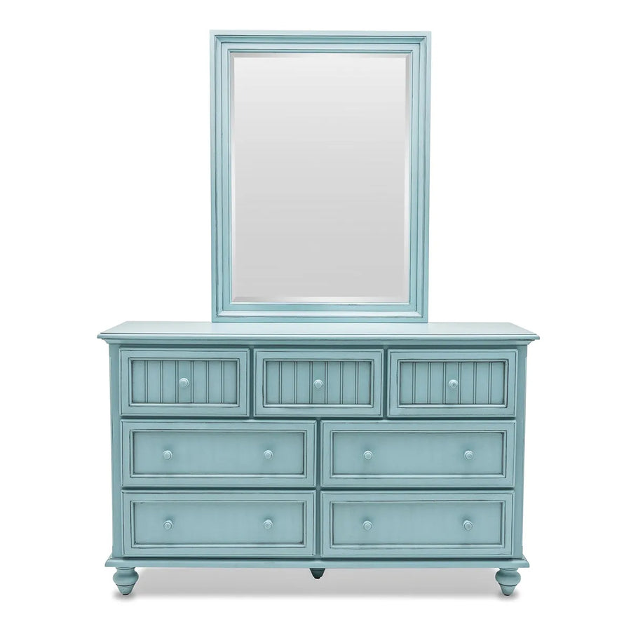 Monaco 7 drawer dresser in Bleu with the matching mirror standing upright above it