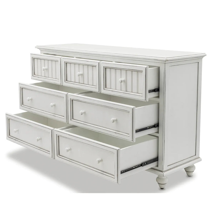 Monaco Blanc dresser with all seven drawers pulled open on metal glides