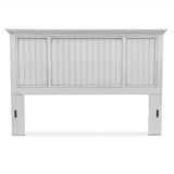 Monaco king headboard in Blanc from the front, with a wide center beadboard panel between two narrower ones