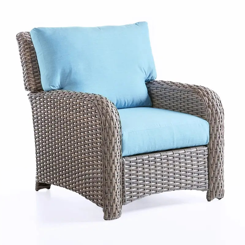 South Sea Rattan St. Tropez armchair in Stone Gray finish, woven rattan frame with sky blue cushions
