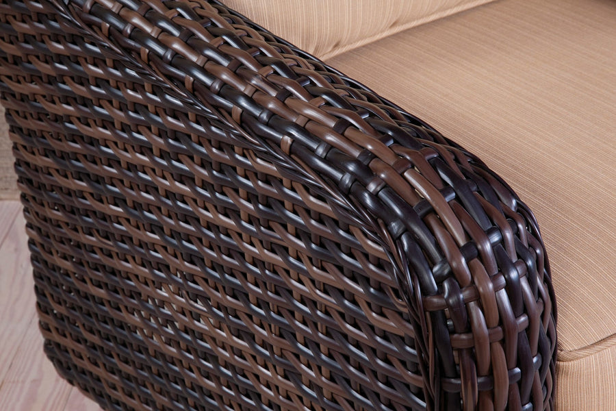 Tobacco resin wicker weave, close view of a rolled St. Tropez arm