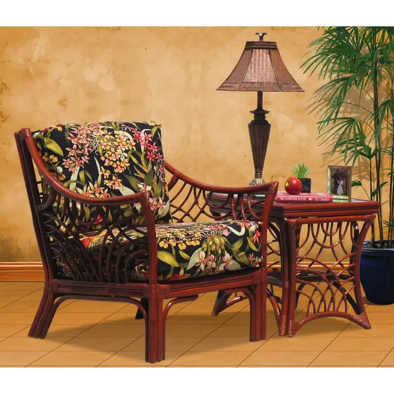 Bali arm chair in Brownwash with black floral cushions beside the matching end table and a table lamp
