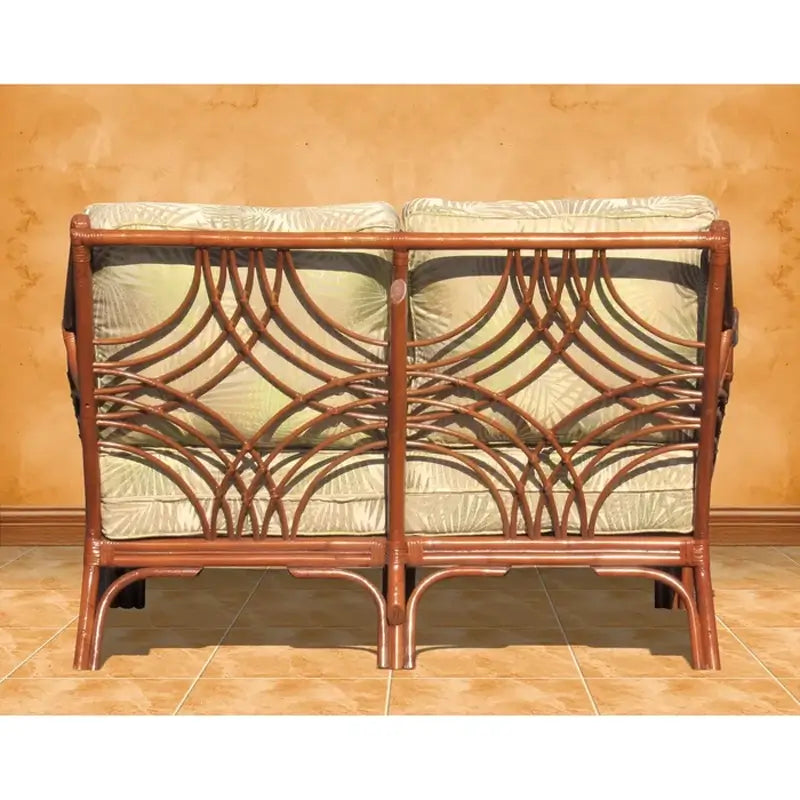 Back of the Bali loveseat in Brownwash, with two panels of overlapping rattan arcs