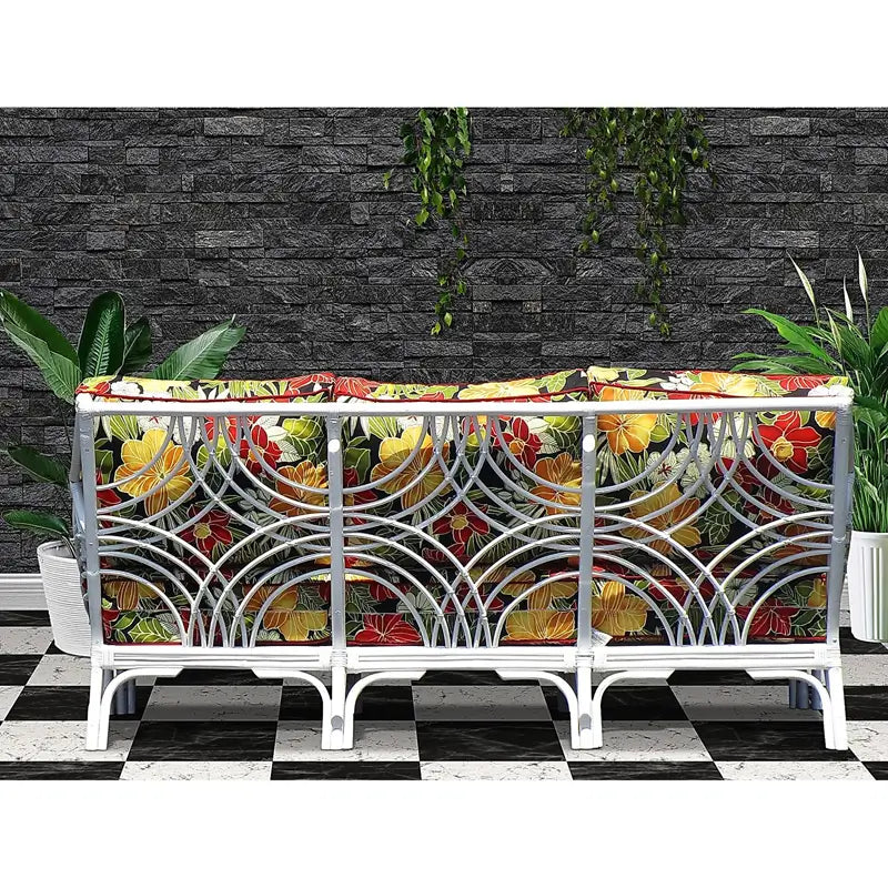 Back of the White sofa from the Bali collection, showing the curved rattan fretwork panels