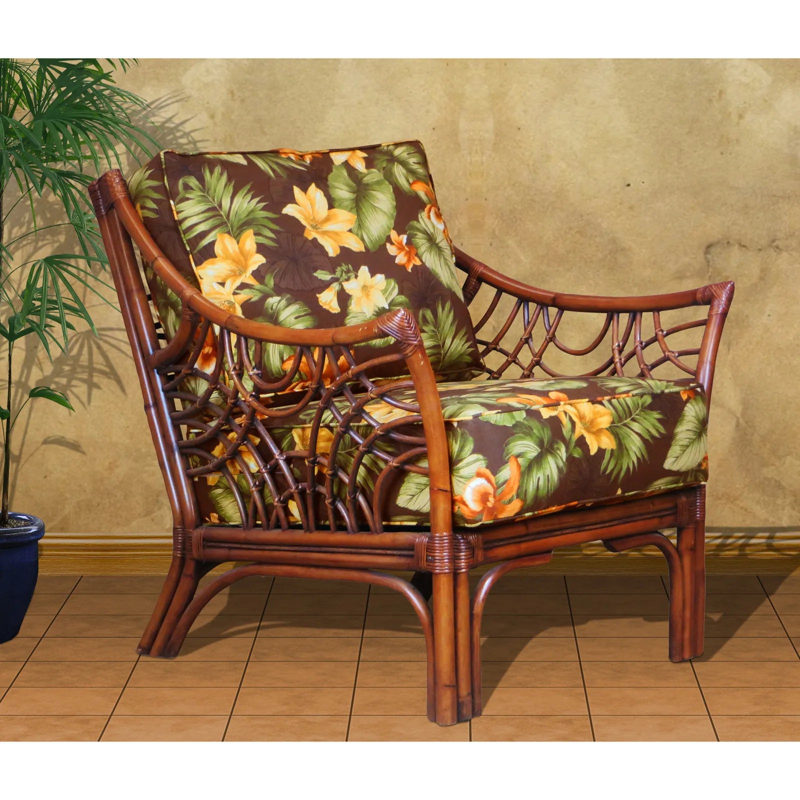 Bali wicker accent chair in Brownwash with dark brown and gold tropical floral cushions