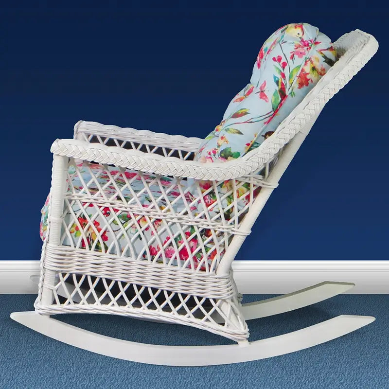 Side profile of a white rocker showing the open lattice side panel, braided arm rail and long curved runners