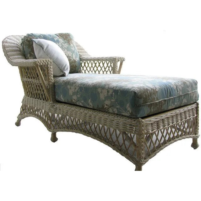 Bar Harbor vintage wicker chaise lounge in Whitewash with a blue patterned cushion and back pillow