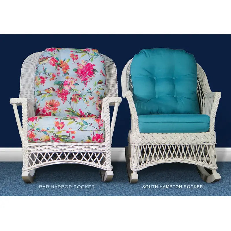 Bar Harbor rocker with floral cushions beside the South Hampton rocker with teal cushions, both in white, seen from the front