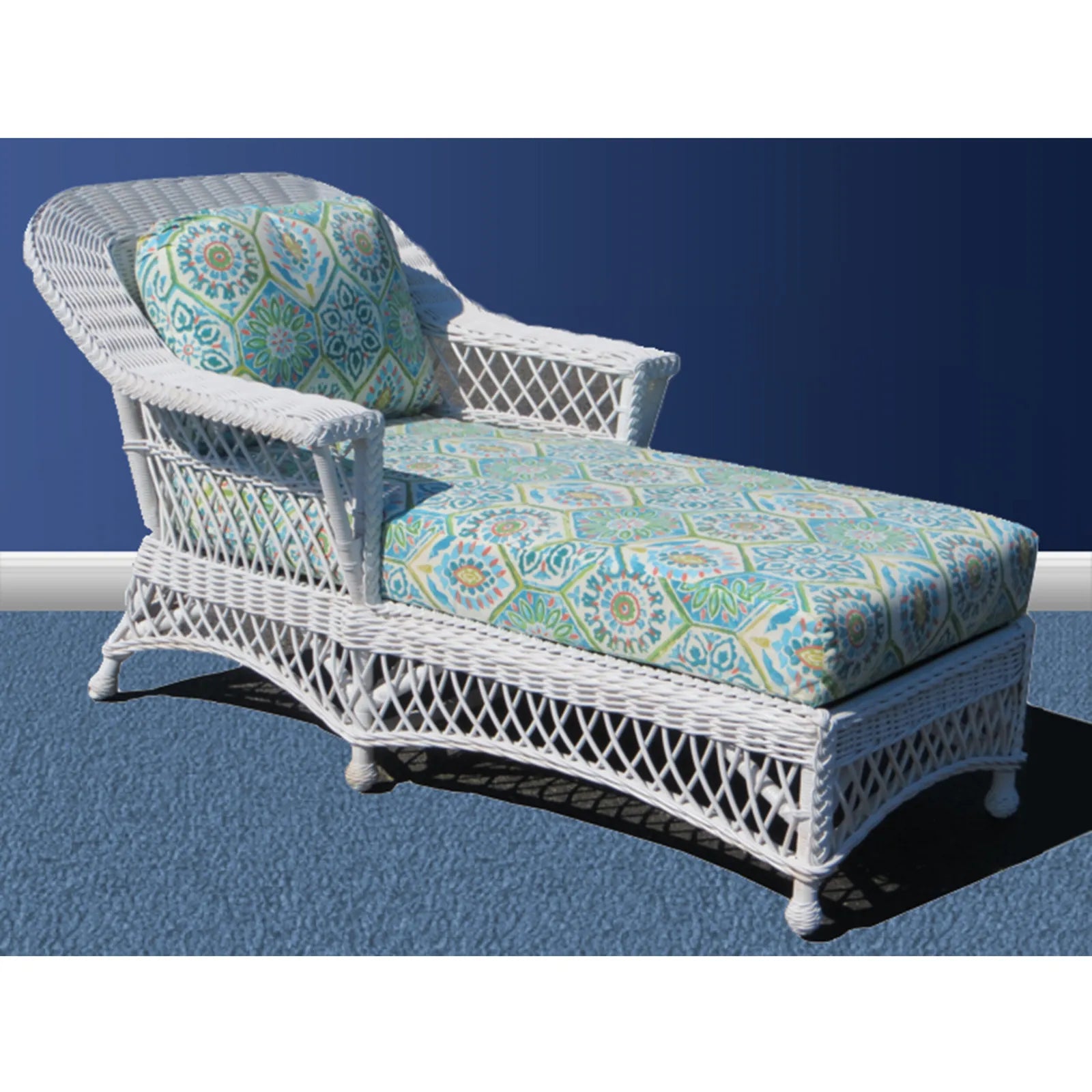 Bar Harbor white wicker chaise lounge with a teal and green patterned cushion and back pillow