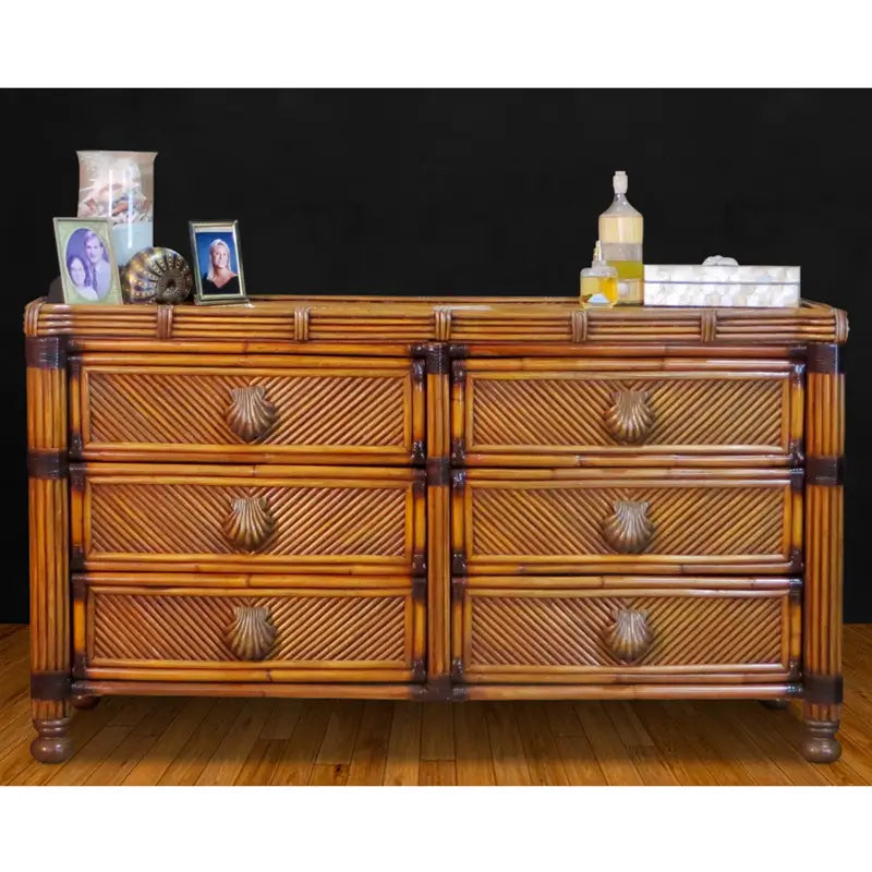 Coral Cove dresser in Antique Brownwash, front view, with diagonal-woven drawer fronts and shell-shaped pulls