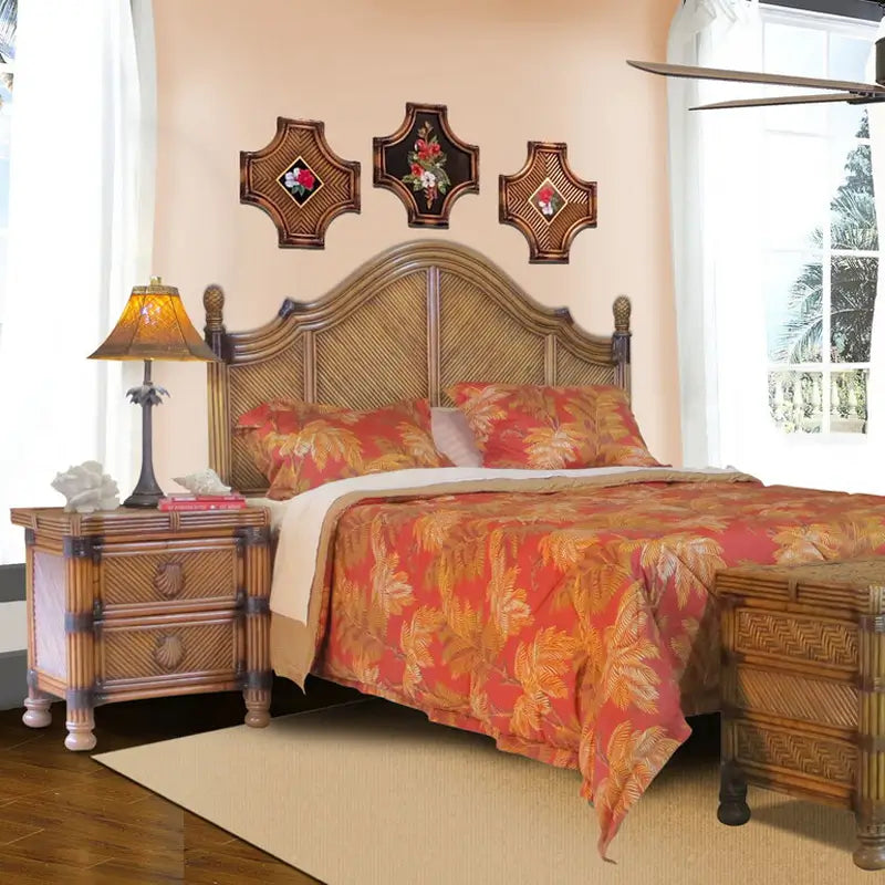 Antique Brownwash Coral Cove headboard in a peach room beside a matching shell-pull night stand