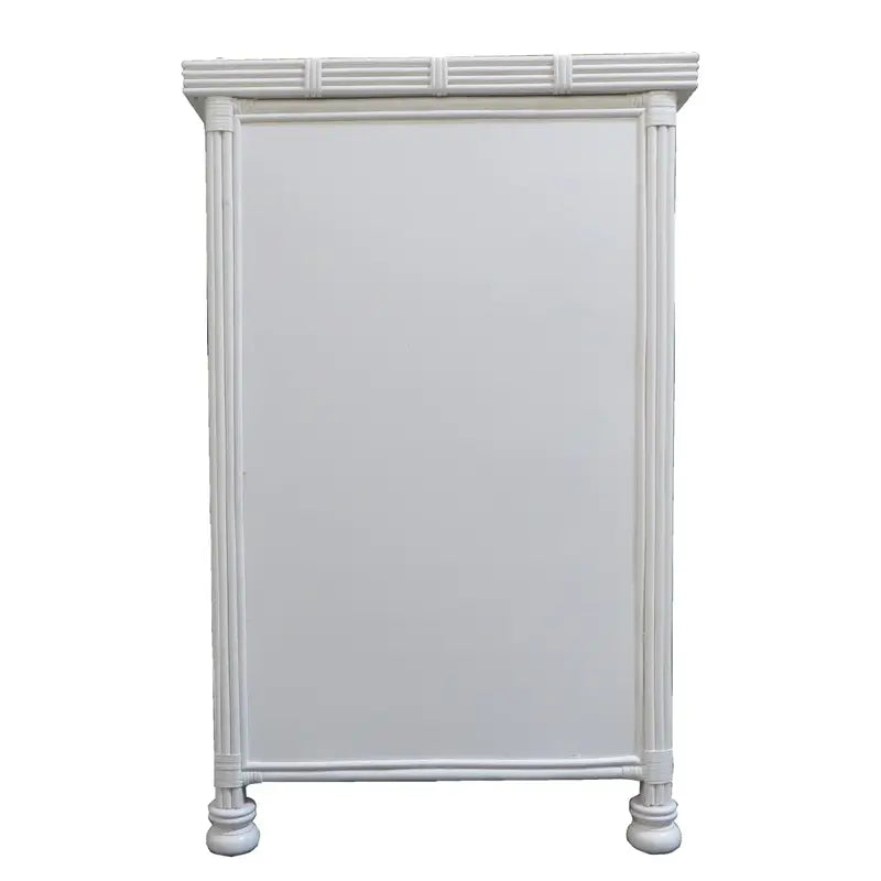 Back of the white Coral Cove dresser showing a smooth finished panel framed by reeded poles