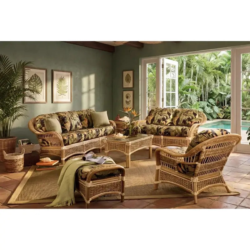 Islander wicker living room furniture in Natural in a room with green walls and doors open to the garden