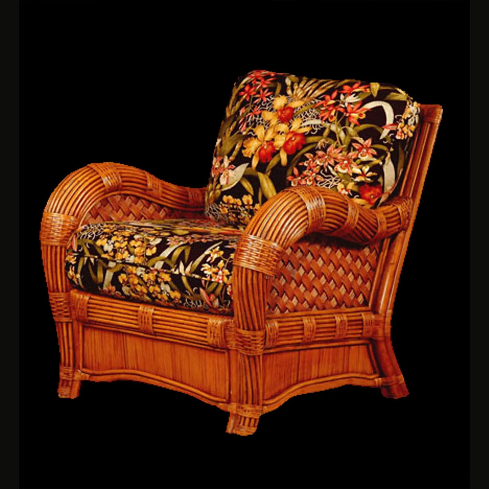 Kingston Reef rattan chair with cushion in cinnamon, angled view, with black tropical floral seat and back cushions