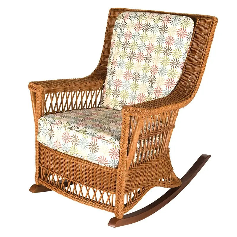 Legacy Rocker by Designer Wicker from Tribor in dark finish with teal coral-print cushions