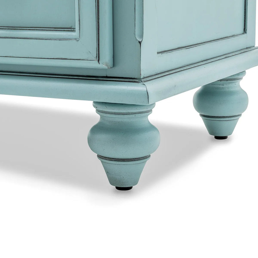 Close-up of a turned foot under the Monaco dresser in Bleu, glazed and lightly distressed