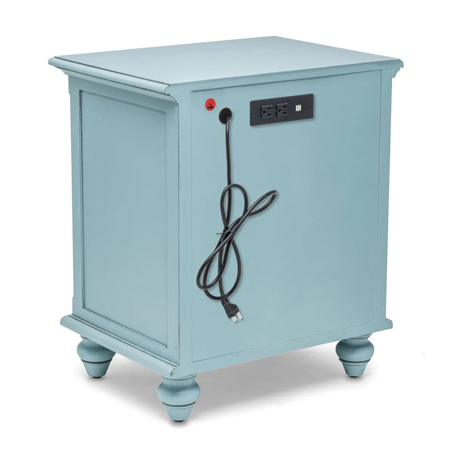 Back of the Monaco nightstand in Bleu at an angle, with a built-in outlet panel and a coiled power cord