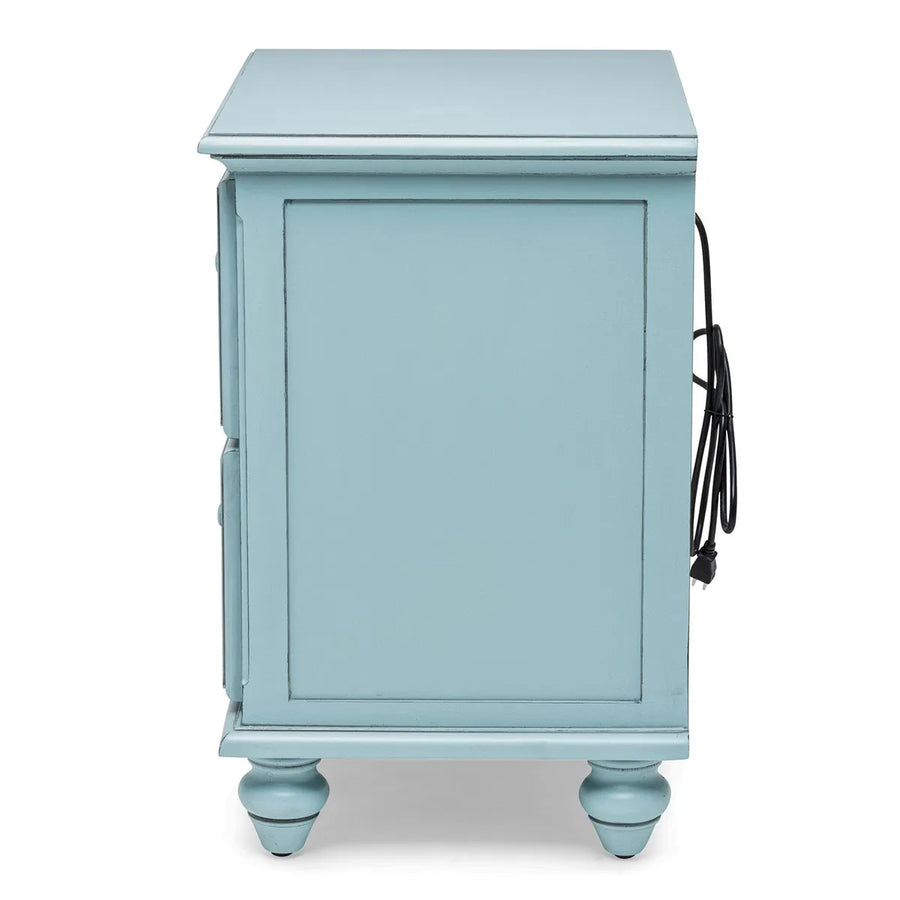 Side of the Monaco nightstand in Bleu with its power cord hanging from the back
