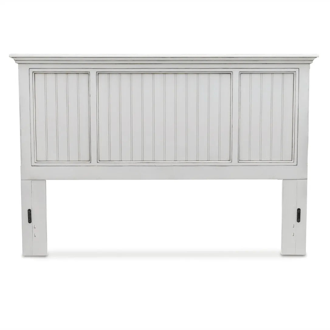 Monaco king headboard in Blanc from the front, with a wide center beadboard panel between two narrower ones