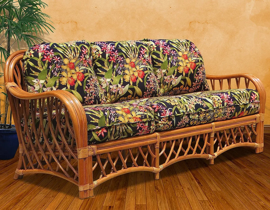 Montego Bay sofa in Cinnamon with black tropical floral cushions