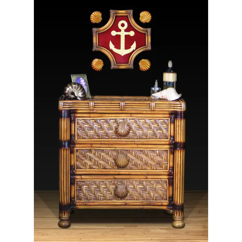 Antique brownwash rattan 3 drawer dresser with diagonal woven drawer fronts, scallop shell pulls and dark-wrapped pole posts