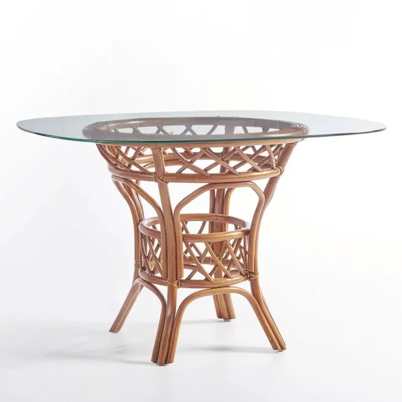 South Sea Rattan Antigua round rattan dining table with glass top and lattice-weave rattan pedestal base