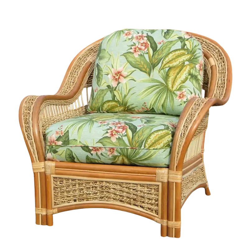 Spice Islands Wicker Spice Island Armchair Natural in a green tropical floral cushion fabric with pink flowers, front angle view
