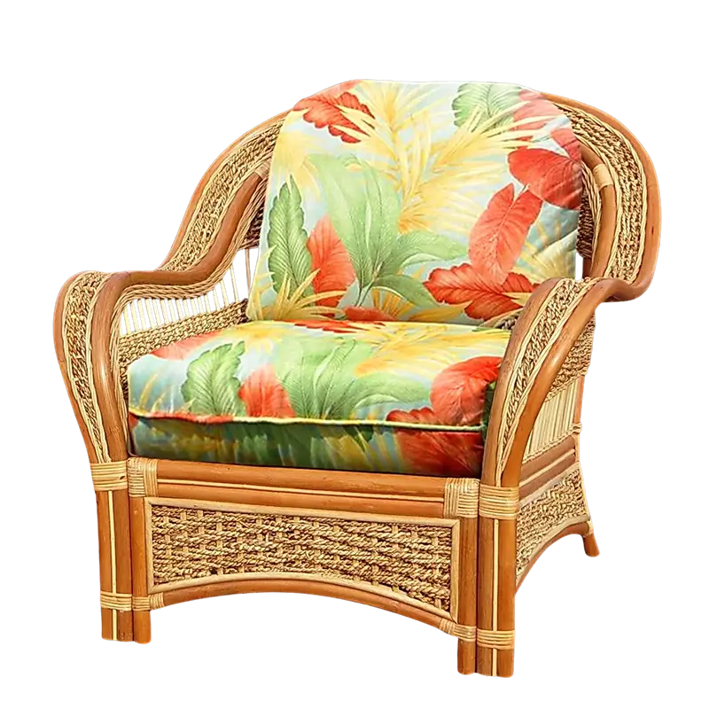 Spice Islands Wicker Spice Island Armchair Natural in a red, yellow, and green tropical leaf print cushion fabric, front angle view