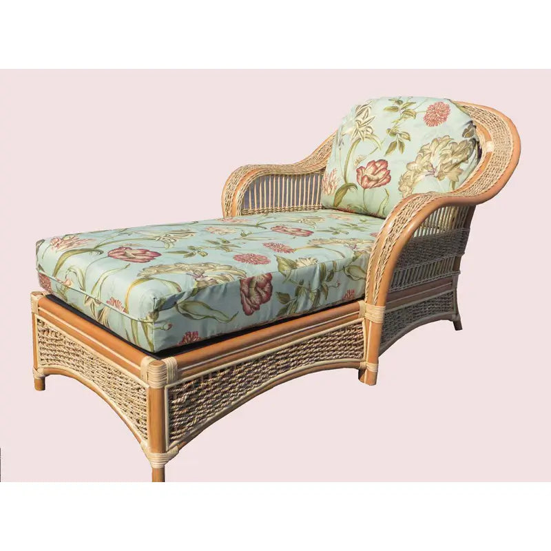 Natural rattan chaise lounge with black palm leaf seat and back cushions, rolled arms and woven base panels