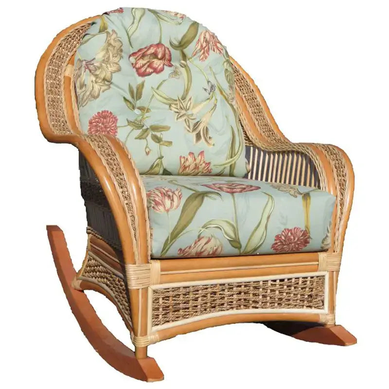 Rocking chair seen from the left side with pale aqua cushions printed with pink tulips, woven panels and curved runners