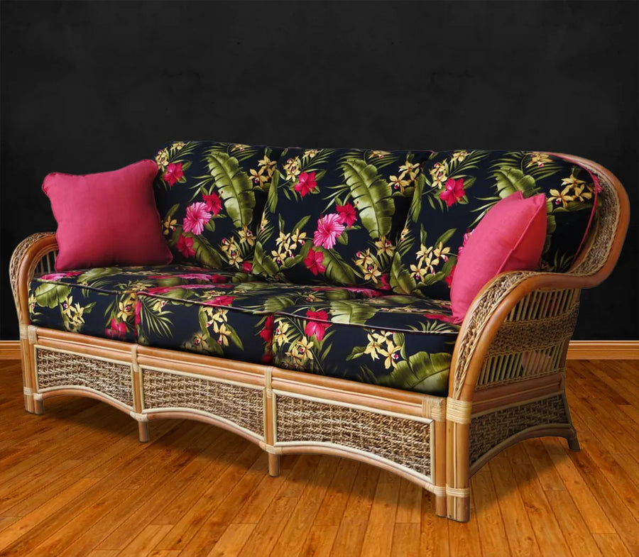 Spice Island sofa in Natural with black hibiscus print cushions