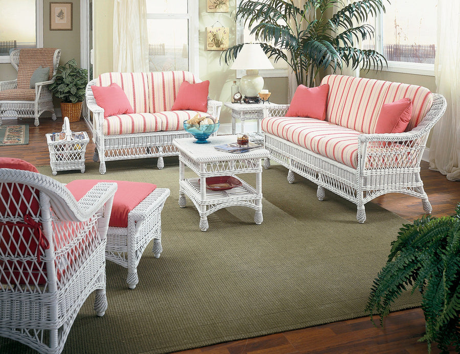 White Harbor Front coffee table in a sunroom with striped seating