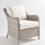 Mayfair lounge chair in Pebble, one of our wicker patio chairs with cushions, with cream seat and back cushions