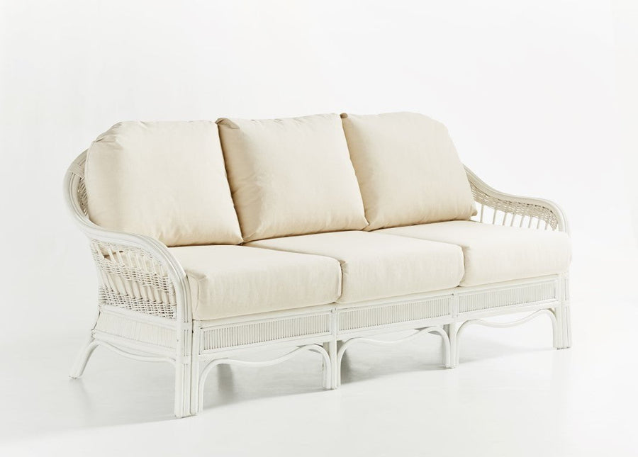 Bermuda Sofa in Whitewash with flared lattice arms and three cream back cushions