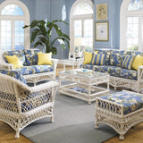 Bar Harbor 6 piece seating set shown in White with Freeport Summer cushions and yellow pillows: sofa, loveseat, arm chair, ottoman, coffee table and end table on a gray rug